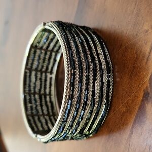 Costume bracelet with silver braids & black beads!